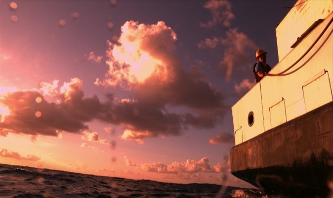 The ROV cameras see a beautiful sunset as the vehicle surfaces next to the ship. Brooke et al 2019, NOAA OER and ROV Global Explorer